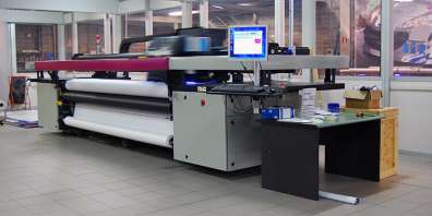 Large-format printer sitting on shop floor