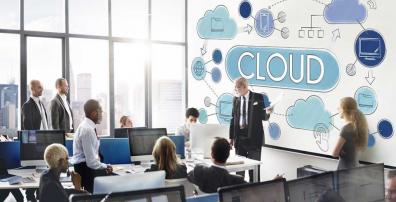 Man giving a talk about cloud computing at a conference