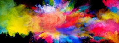 Multi-colored chalk bomb exploding in a rainbow of colors