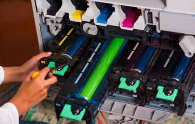 Technician working on printer