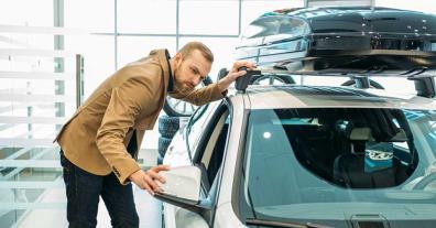 man shopping for cars