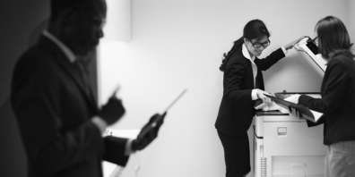 woman using office copier