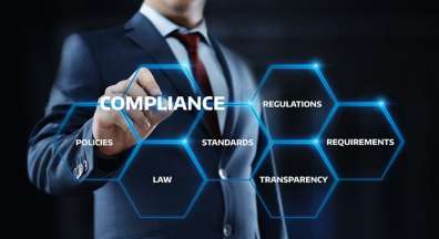 Man pointing at stylized illustration with word "Compliance" in big letters